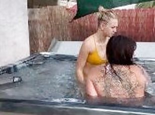 Lesbian couple has a passionate make-out in their new jacuzzi