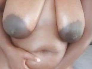 Amateur Ebony MILF tortures her saggy Tits