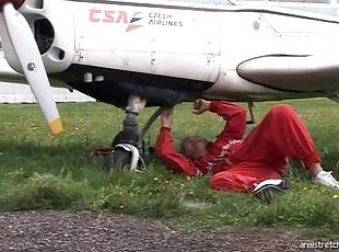 Airplane mechanic fucks a curvaceous chick on the wing