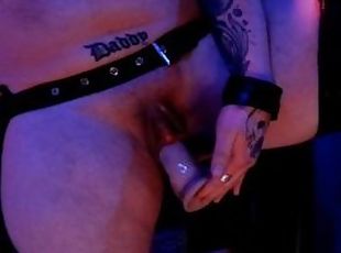 Horny tattooed FTM plays with his swollen cock and squirts in leather chaps