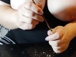 Big tit step mom rolls a joint with her tits out