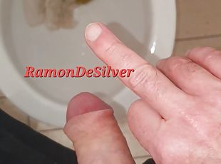 Master Ramon pisses, spits and jerks hot milk in public toilet, lick slave!
