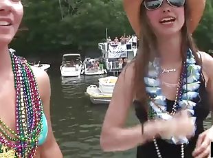 Gorgeous girls get naked on the boat