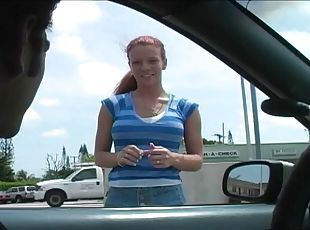 Crazy redhead Brandi Mae gives head in the back of a car