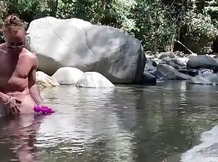 Trans guy ftm jacking off big clit with sex toy in the river