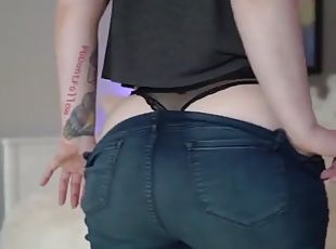 Pawg with enhanced booty in blue jeans strips & shows her ass hole before she twerks & claps her bare booty cheeks