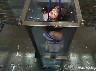 Sexy Swiss gets tied up and tortured in water bondage vid