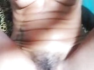 Quick double orgasm on the couch watching some loud gay porn. Clenching hard my wet hairy pussy.