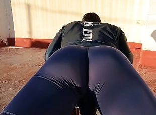 Fitness instructor in tight spandex gets erect while stretching (precum)